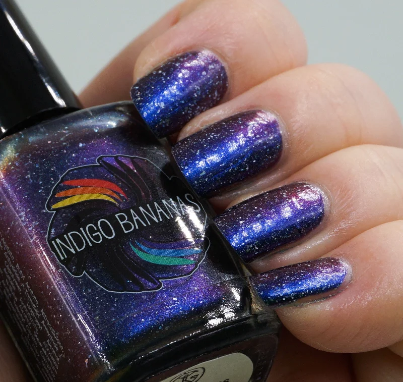 nail polish rooftop view-What Dreams May Come - dark blue multichrome linear holographic w/ flakies